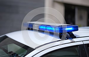 Closeup of blue lights on roof of police car