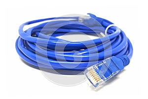 closeup of blue network cable on white