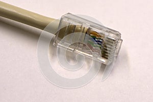 Closeup of blue network ethernet cable on white background with space for text .