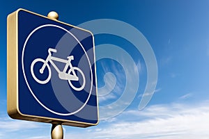 Road Sign of a Bicycle Lane on a Clear Blue sky with Clouds - Photography