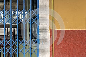 Closeup of blue sliding grille door