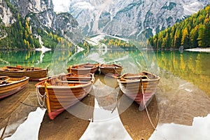 Closeup on boats on lake braies in south tyrol