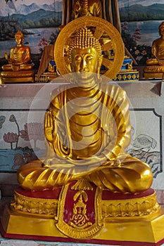 Closeup of Bodhisattva in Main Prayer Hall of Wang Saen Suk monastery, Bang Saen, Thailand