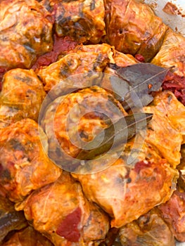 Closeup of boiled sarmale with bay leaves. Traditional Romanian food