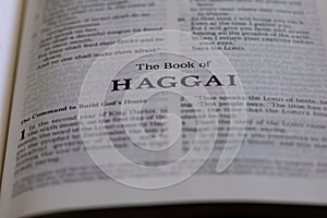 Closeup of the Book of Haggai from Bible or Torah, with focus on the Title of Christian and Jewish religious text.