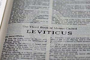 Closeup of the Book of Leviticus from Bible or Torah, with focus on the Title of Christian and Jewish religious text.