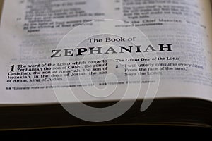 Closeup of the Book of Zephaniah from Bible or Torah, with focus on the Title of Christian and Jewish religious text.