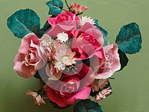 Closeup of a bouquet of artificial flowers from above