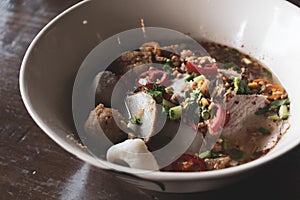 Closeup of a bowl of spicy soup noodle