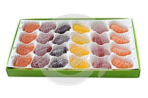 Closeup box of sugar jelly fruit candy isolated