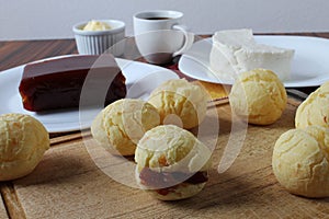 Closeup of brazilian bread cheese stuffed with guava paste, white cheese and coffee.