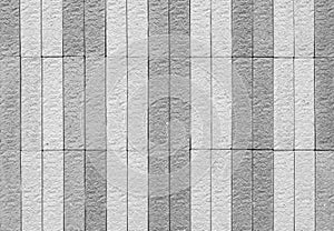 Closeup brick pattern at brick stone wall texture background in black and white tone