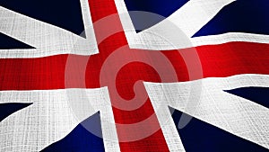 Closeup of British United Kingdom UK flag blowing in the wind texture background with cloth texture. Close up Union Jack flag