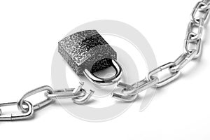 Closeup on broken chain and padlock on white background