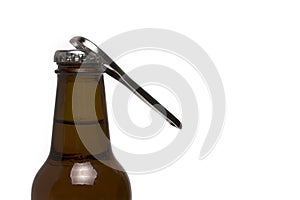 Closeup brown bottle opener cap white background