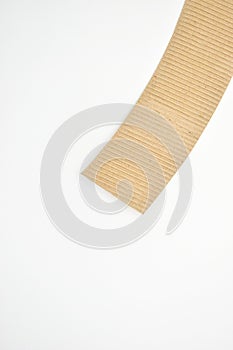 closeup brown paper cardboard texture on white background