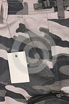 Closeup brown tone camo pocket shorts with tag (front)