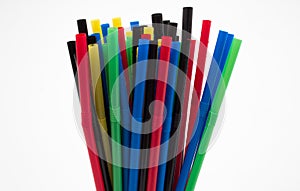 Closeup of a bundle of colorful bendy straw isolated in white background