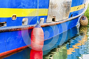 Closeup of Buoys hanging off of boat