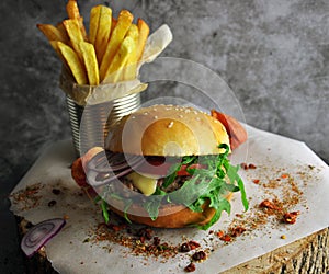 Closeup burger, fries and onion