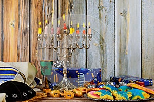 Closeup of a burning Chanukah candlestick with candles Menorah