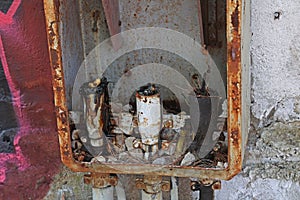 Closeup of burnt junction box with cable remnants