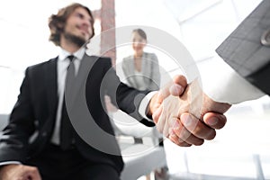 Closeup of a business hand shake