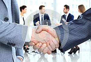 Closeup of a business handshake. Business people shaking hands