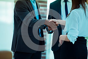 Closeup .business handshake financial partners on the background of the office