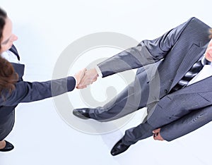 Closeup of a business handshake men and business women.