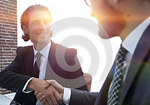 Closeup. business handshake in an office.