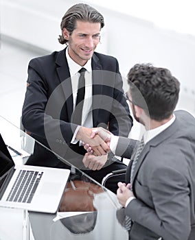 Closeup. business handshake in an office.