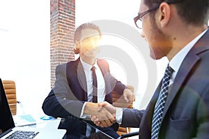 Closeup. business handshake in an office.