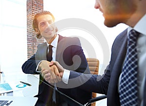 Closeup. business handshake in an office.