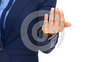 Closeup on business woman beckoning with hand