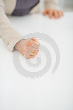 Closeup on business woman knocking on table