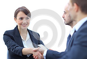 Closeup of business woman shaking hands with her colleague.