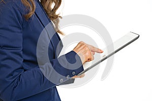 Closeup on business woman working on tablet pc