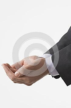 Closeup Of Businessman Cupping Hands