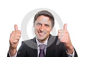 Closeup of a businessman gesturing thumbs up