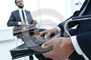 Closeup Of A Businessman Holding Briefcase