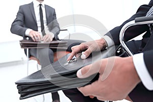 Closeup Of A Businessman Holding Briefcase