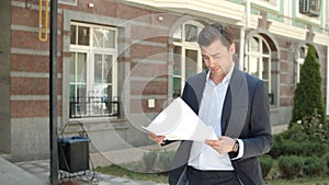 Closeup businessman walking to job. Man going to work with smile at street