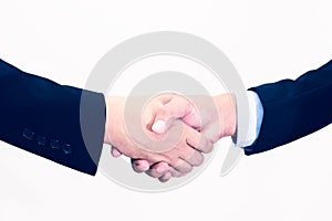 Closeup of businessmans handshake isolated on white background