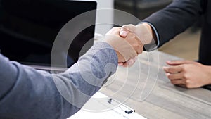 Closeup of  businessmen handshake at partnership corporate meeting, Business corperate partnership handshake to collaboration