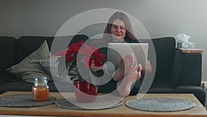 Closeup businesswoman hands typing laptop keyboard in open space. Serious manager messaging with client at workplace