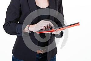 Closeup businesswoman with tablet computer in white office