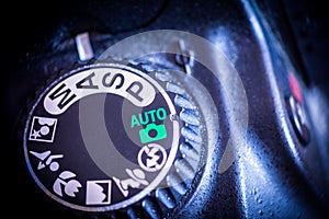 Closeup on camera mode selection dial