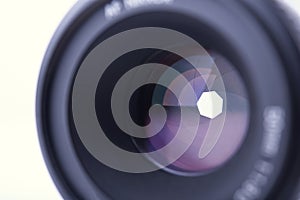 Closeup camera shutter lens on white background
