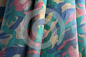 Closeup camouflage fabric pattern like military, but colorful color.